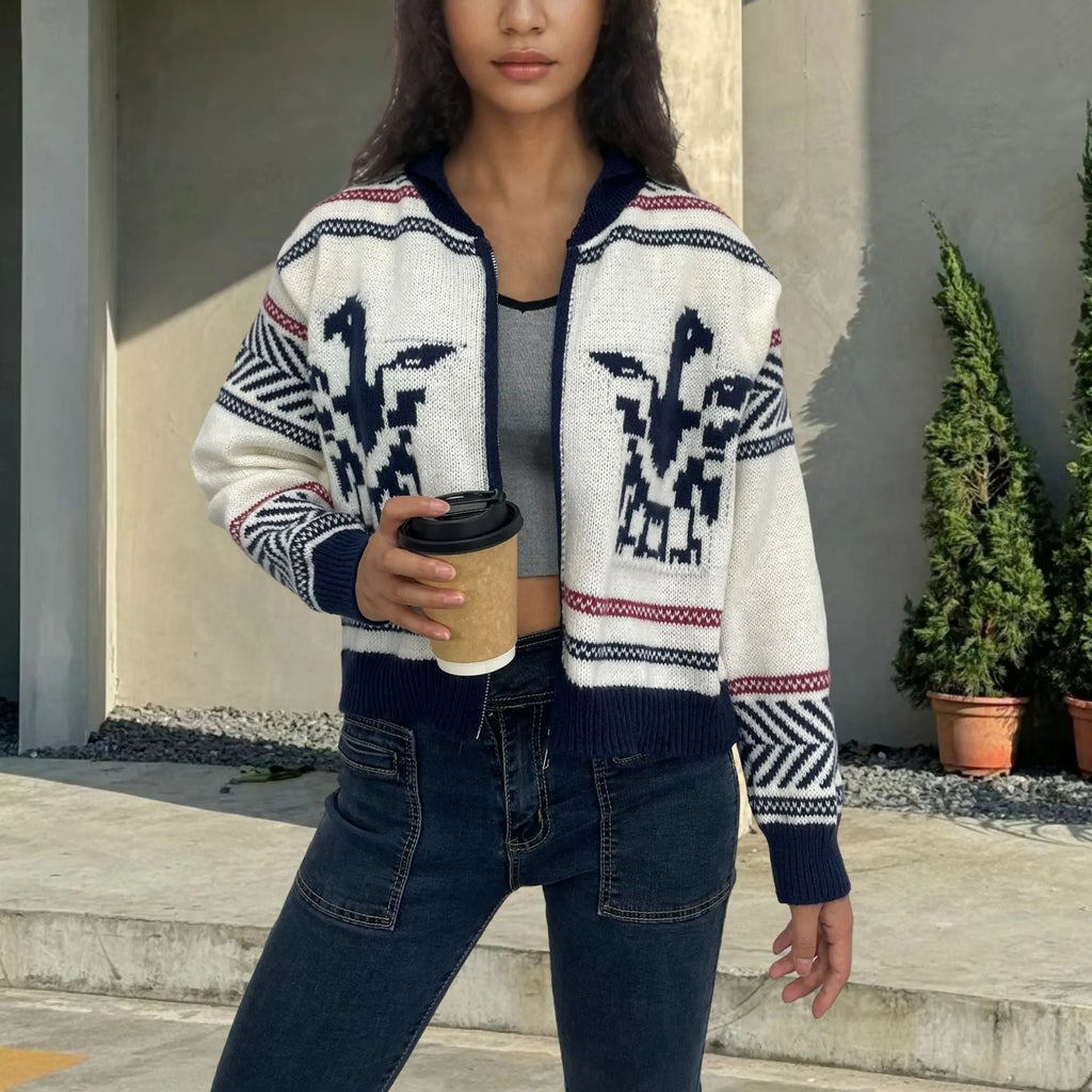 White women's wool jacquard cardigan with contrast colour pattern, lapel collar, and front zipper.
