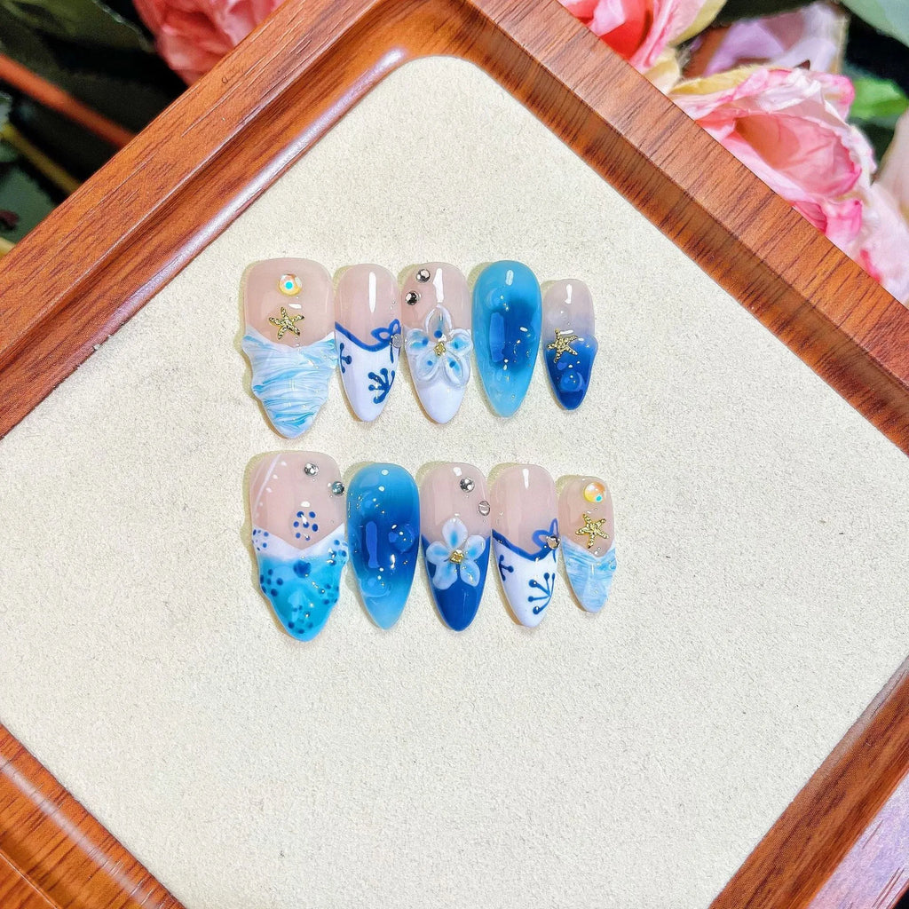 Blue hand-painted carved summer ice transparent plastic fake nails in four sizes