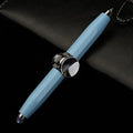 Metal ballpoint pen with integrated LED gyro spinner showing colour-changing lights during spinning