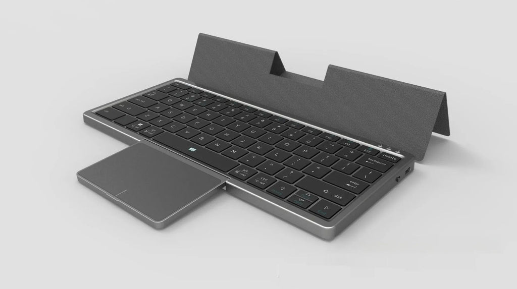 Three-in-one Bluetooth keyboard with touch pad and leather sheath in black, pink, or silver colour options