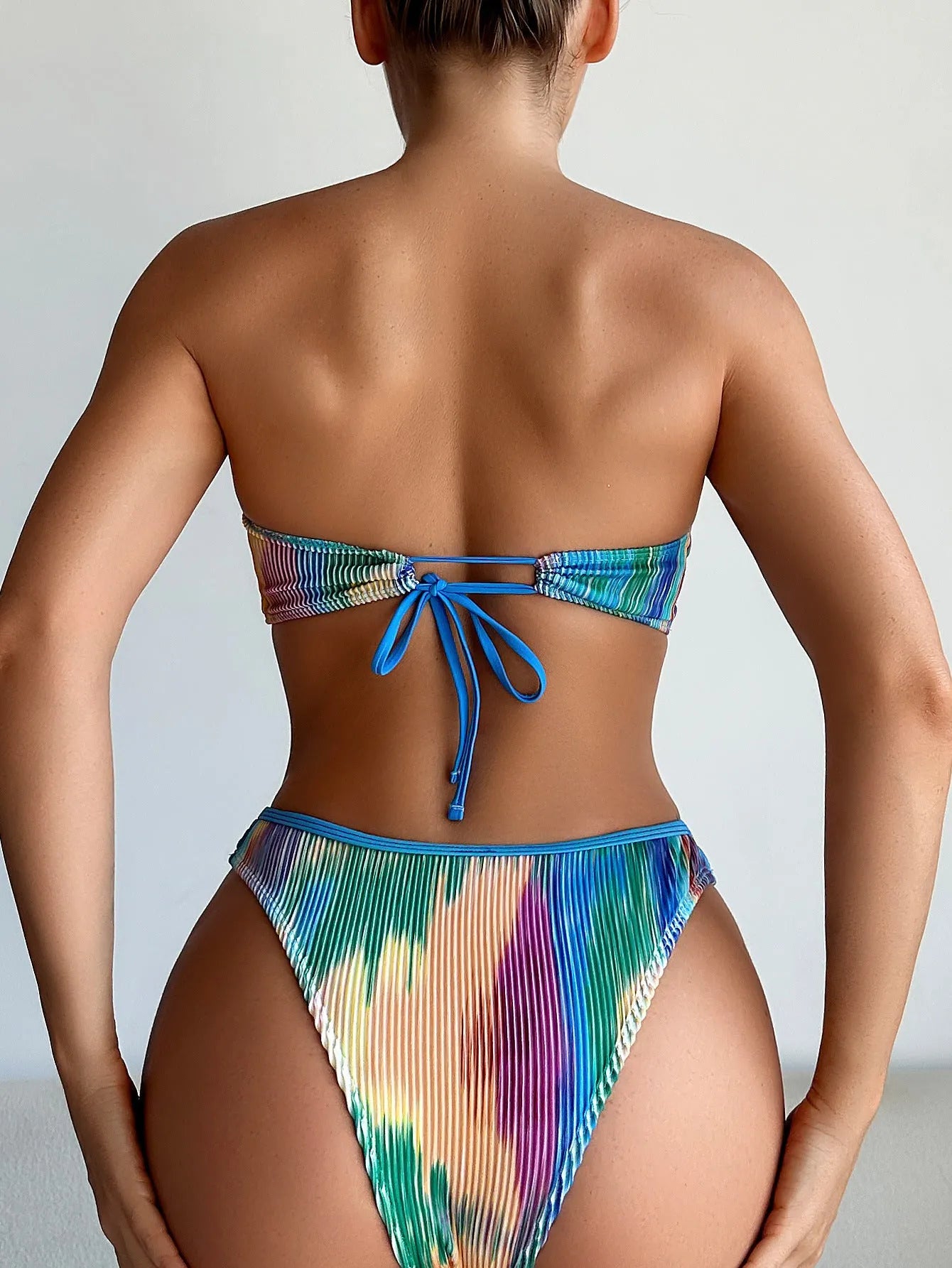 Colour printed polyester tube top bikini set with briefs on a mannequin
