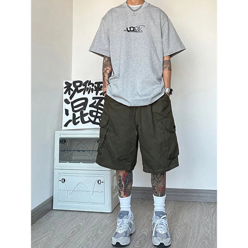Loose straight casual sports shorts in polyester micro-elastic fabric showing colour options