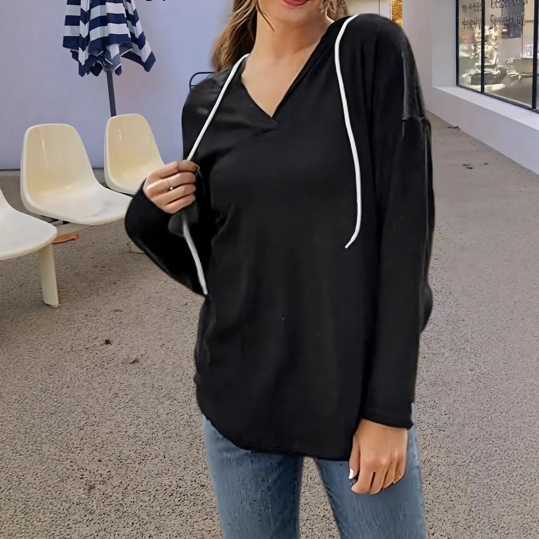 Women's red hooded V-neck sweatshirt with long sleeves and loose fit