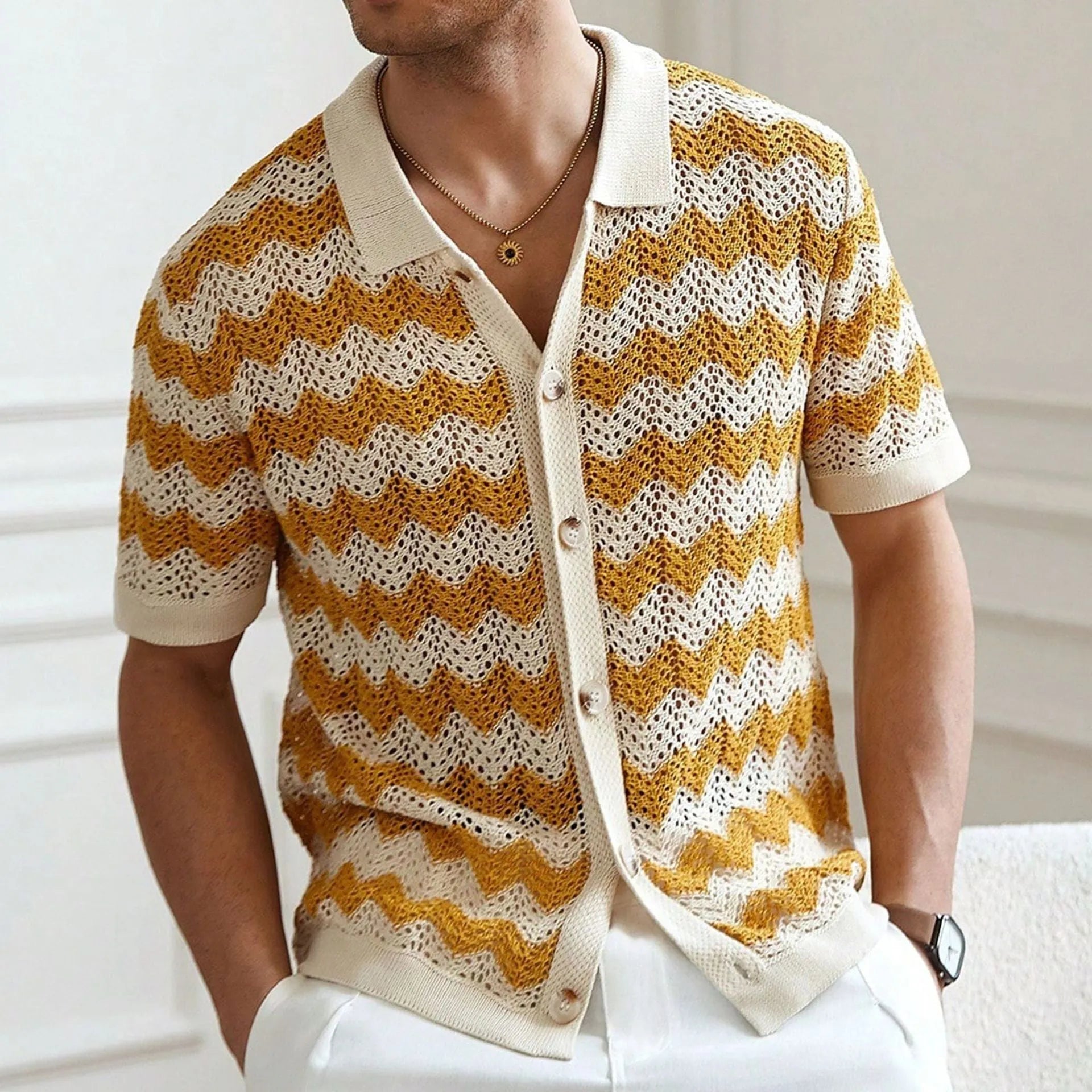 American-style hollow jacquard corrugated short-sleeve sweater in blue, shown on a hanger.