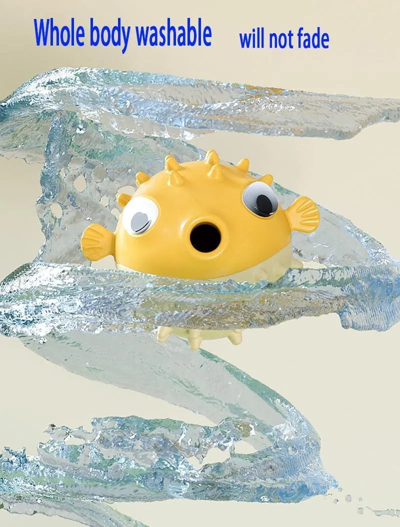 Green fish-shaped interactive dog chew toy with textured surface and internal bell.