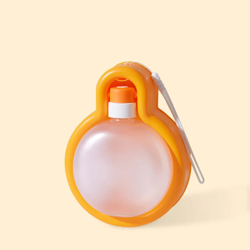 Green portable dog water bottle with retractable drinking bowl for travel and outdoor use.