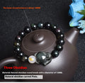 Natural obsidian bracelet with zodiac guardian design and 10mm stone beads