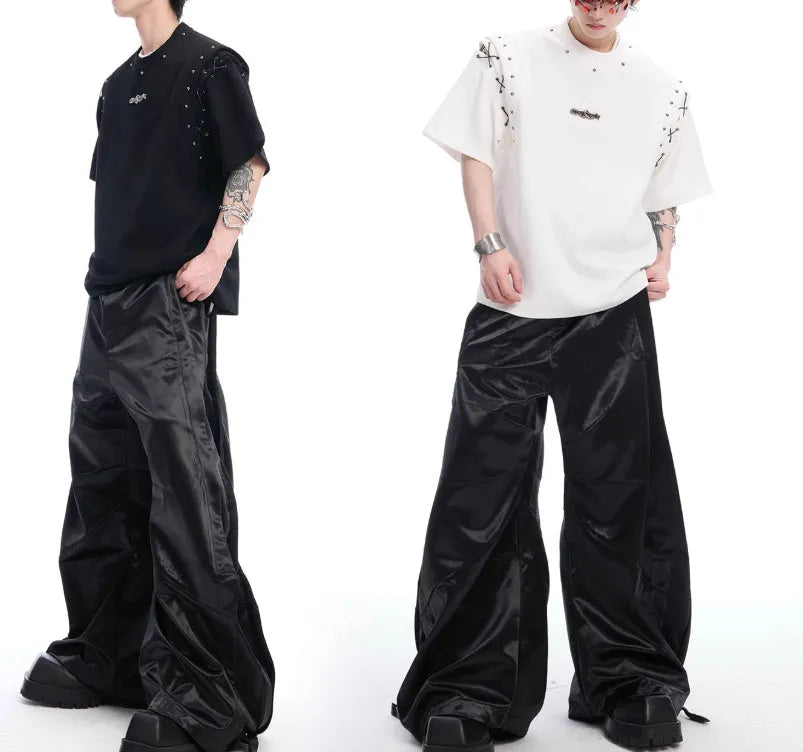Black deconstructed short sleeve t-shirt with lace-up detail and a cutout design on a mannequin.