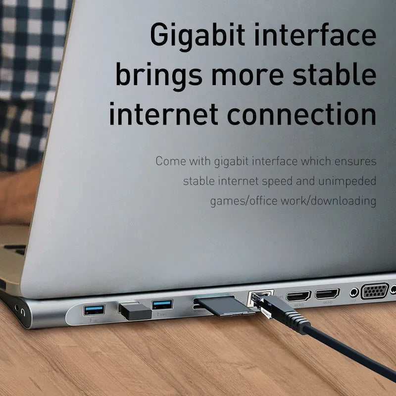 Grey aluminium ten-port docking station with cooling bracket showing HDMI, VGA, and Ethernet ports