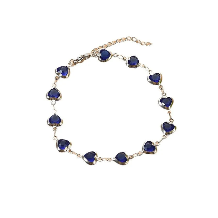 A stainless steel geometric heart bracelet with a Devil's Eye design in one of six electroplated colour options.