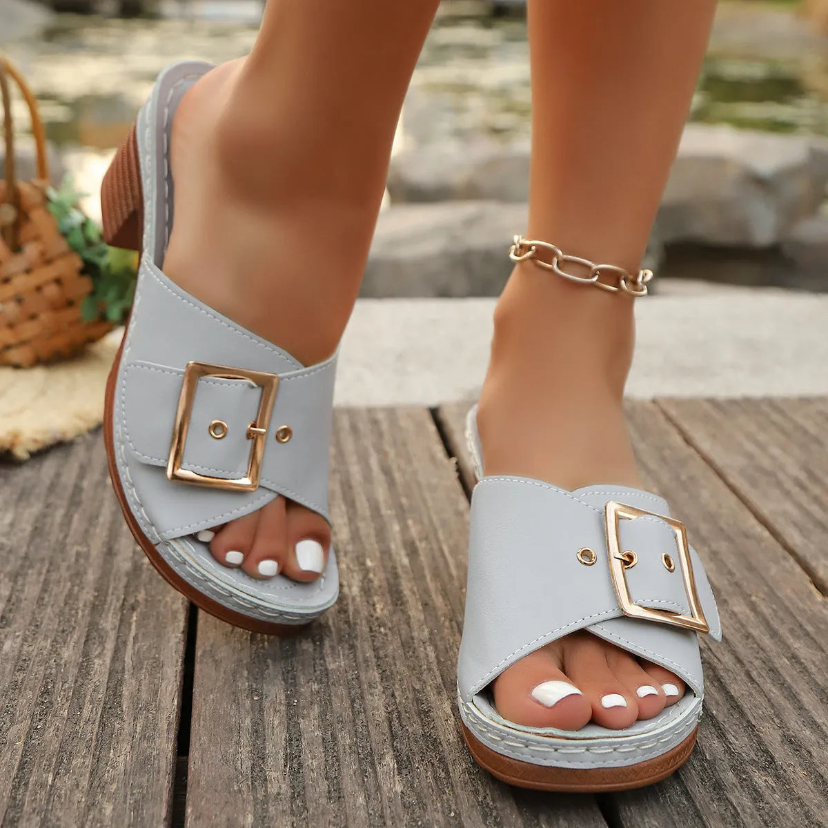 Women's black chunky heel slippers with metal buckle and round toe
