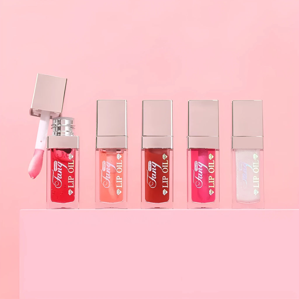 Mint lip gloss and lipstick set showing five bright colour options with lip essence oil