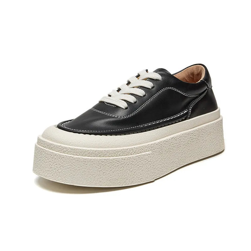 Women's black platform casual board shoes with embossed cowhide leather and round toe
