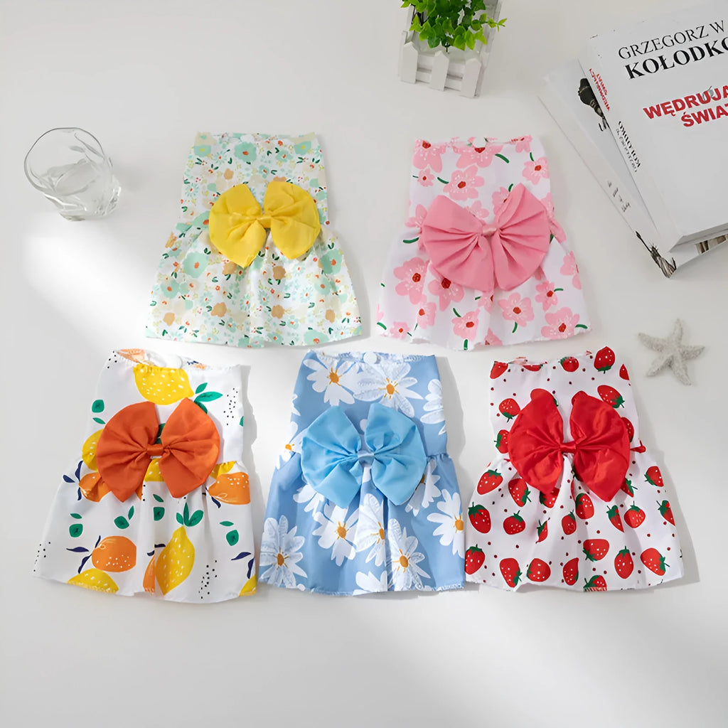 Ultra-thin light orange pet dress for a small dog with a floral butterfly knot on the back.