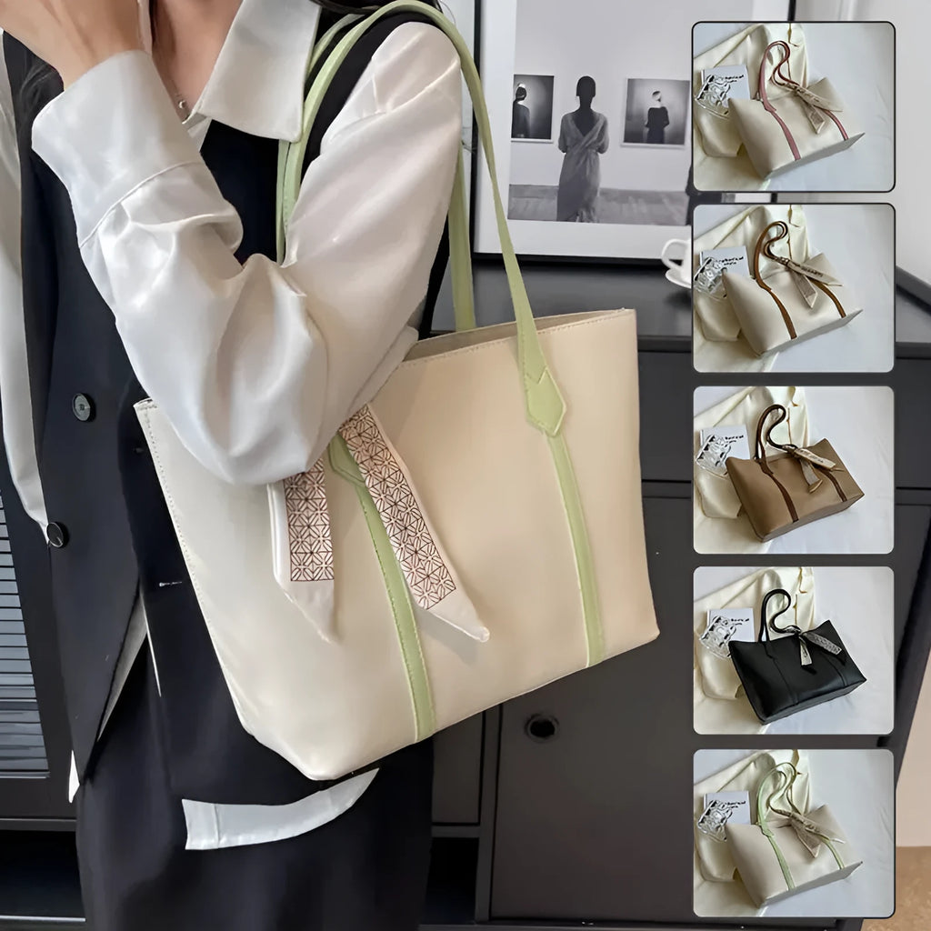 Women's soft large capacity tote bucket shoulder bag in khaki colour showing crossbody strap and front sandwich pocket.