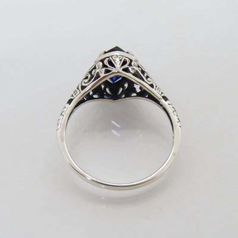 Silver geometric hollow alloy ring with zircon detailing shown in women's sizes 5 to 11