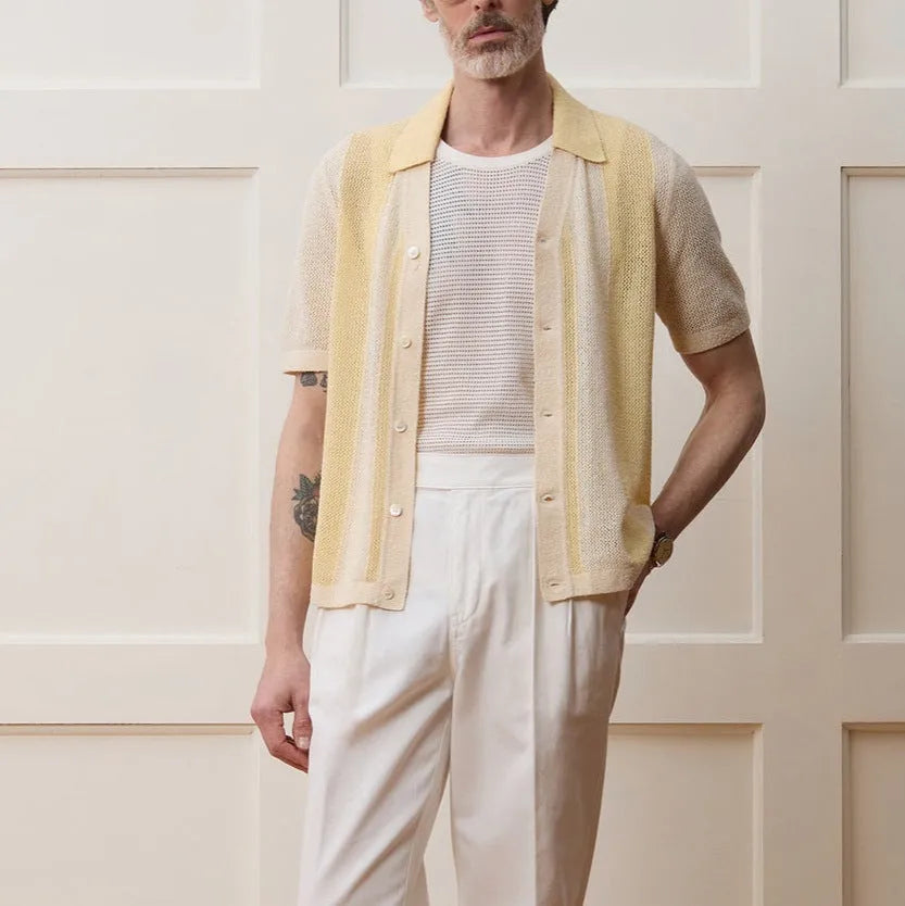 Yellow casual polo shirt with hollow-out detailing and asymmetric design, short sleeves for summer wear