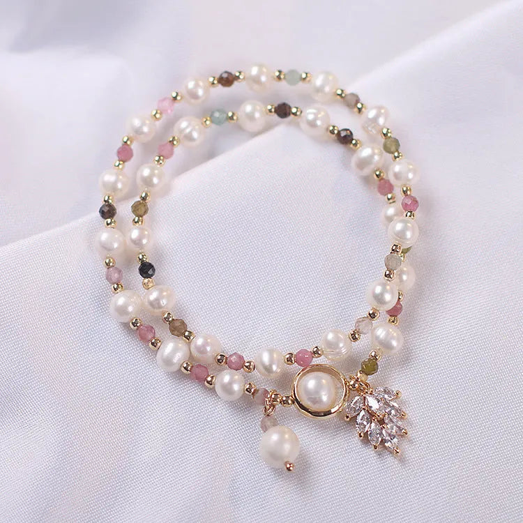Double layer strawberry quartz bracelet with lucky cat charms and red cat's eye flower beads