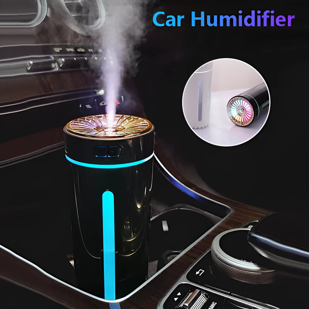 Black portable USB humidifier with colourful LED lights, shown next to a USB cable, suitable for car cup holders.