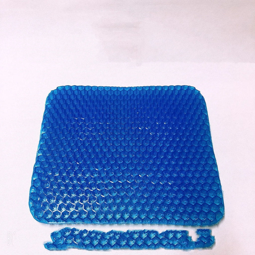 Gel seat cushion with honeycomb pattern showing removable cover and double-thick construction