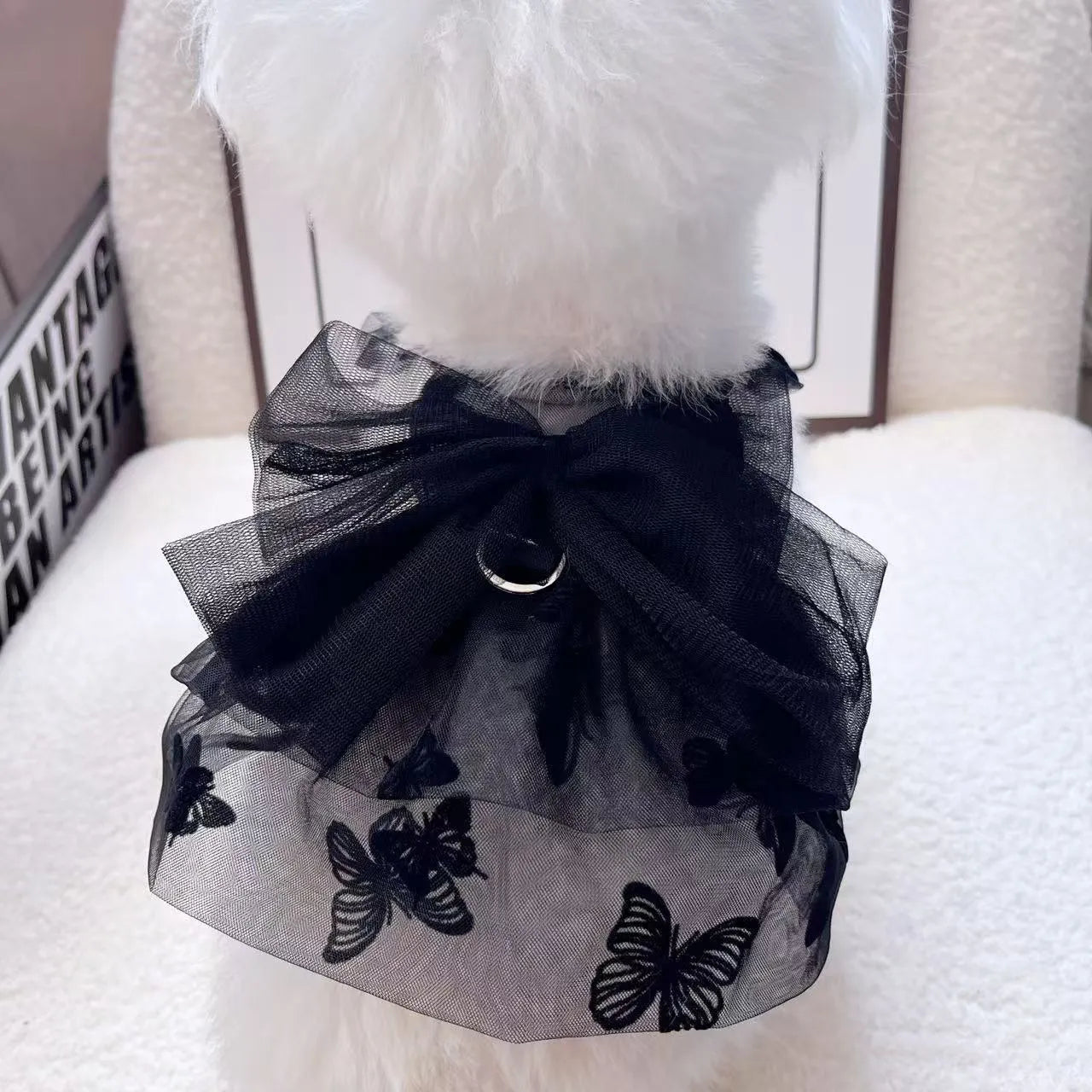 Black gauze princess tulle skirt for a small dog or cat on a mannequin, showing the layered design.