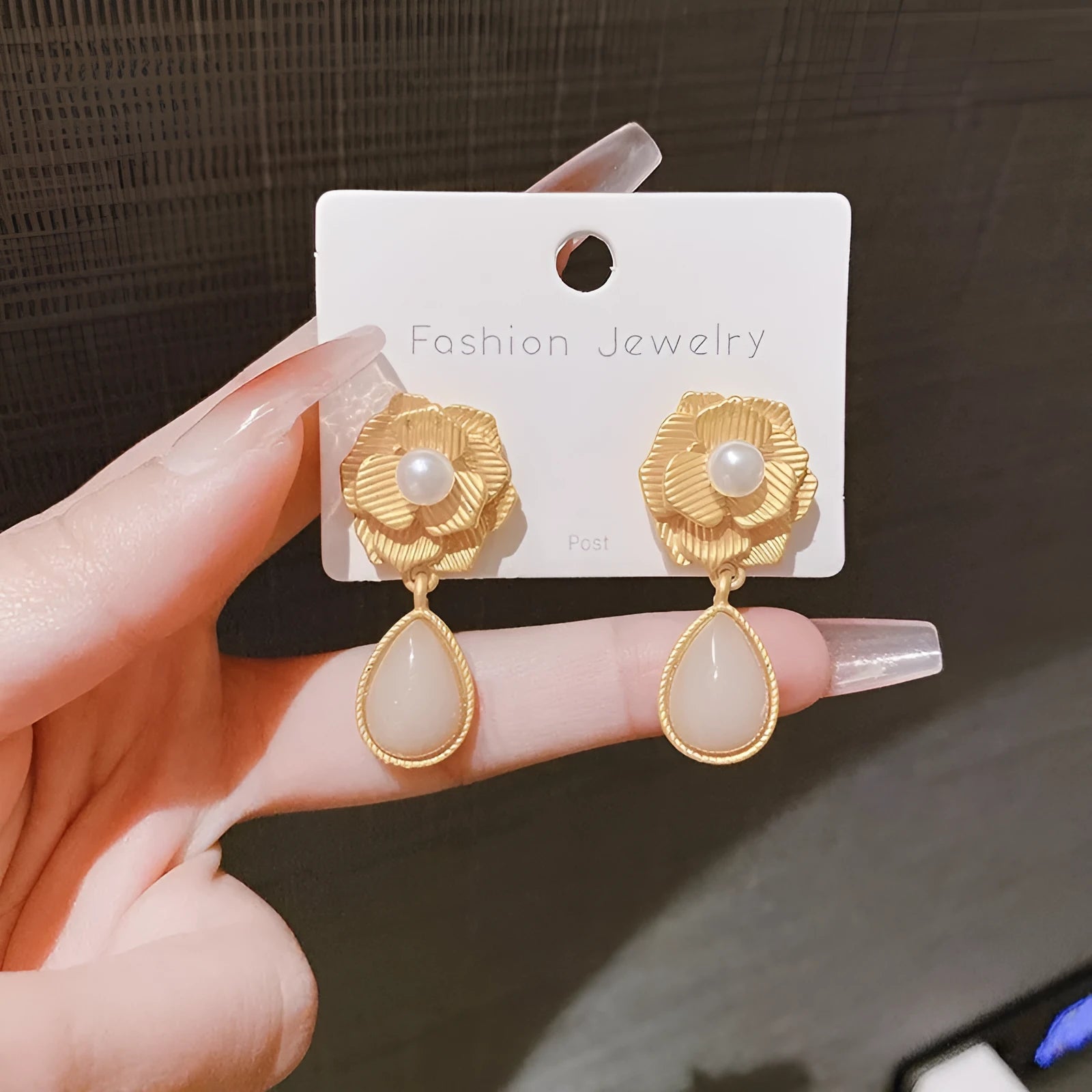Gold Hong Kong style flower stud earrings with pearl rose design and ice flower pattern