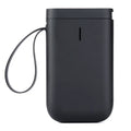 Compact D11 Bluetooth thermal label printer in black, with smartphone showing label design app.