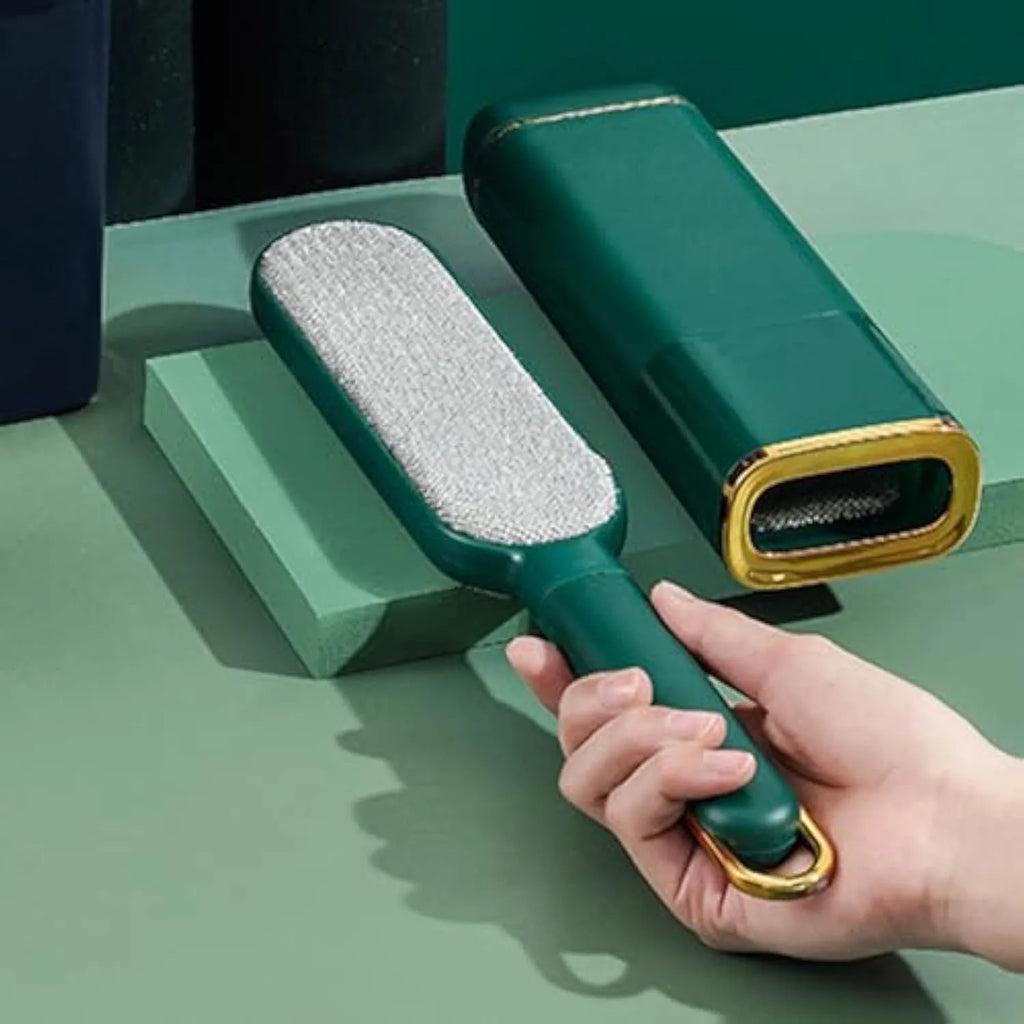 Reusable pet hair remover brush with a plush head and storage base, shown in blue, green and white colour options.