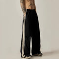 Men's black wide leg climbing trousers with high waist and straight leg design on mannequin