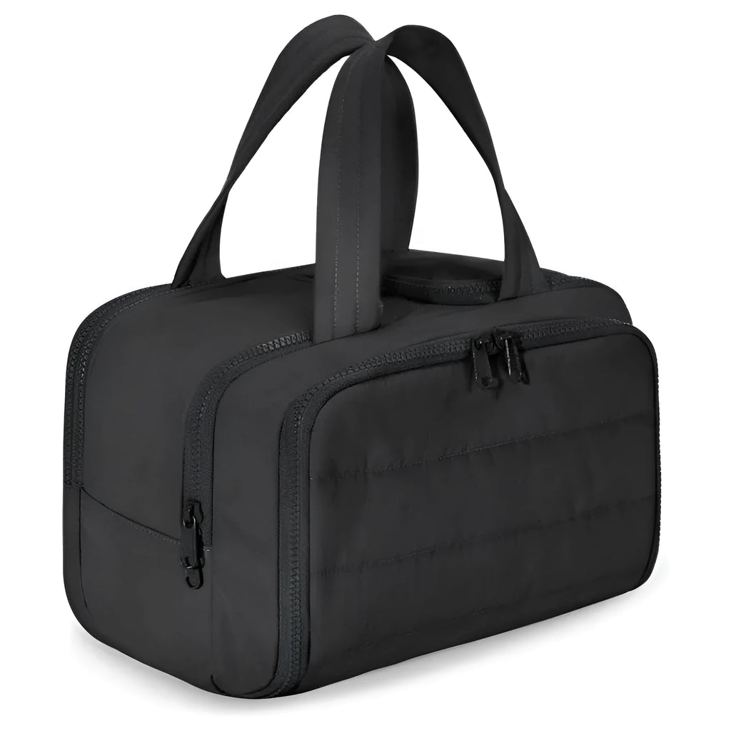 Large travel toiletry bag with wide opening showing interior organisation compartments