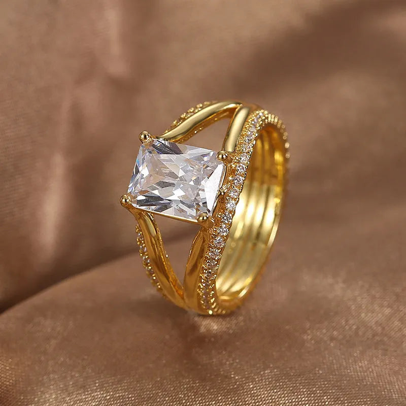 Geometric women's ring with square zircon stone on gold electroplated copper band