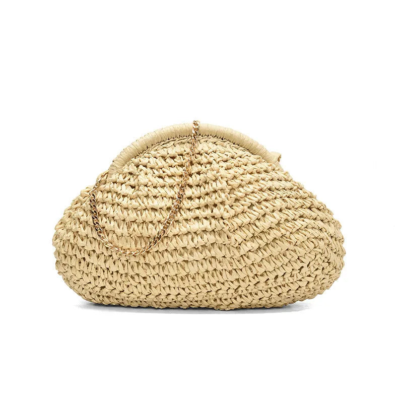 Women's khaki straw shoulder bag with chain detail and shell shape on a neutral background