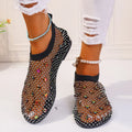 Women's flat sandals with mesh upper and colourful rhinestone decoration, round toe design