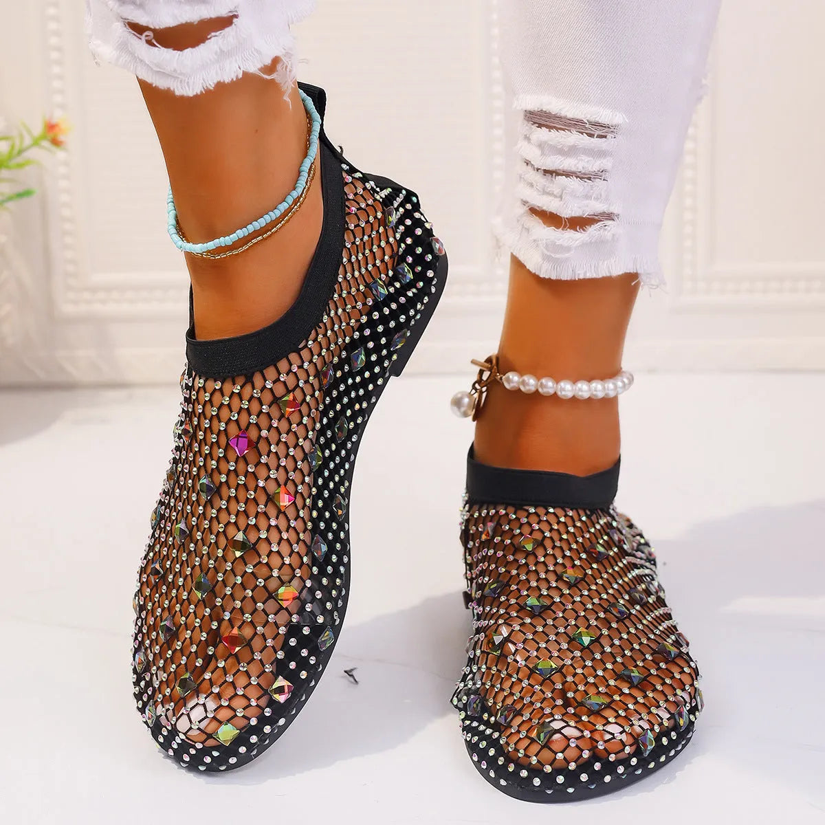 Women's flat sandals with mesh upper and colourful rhinestone decoration, round toe design