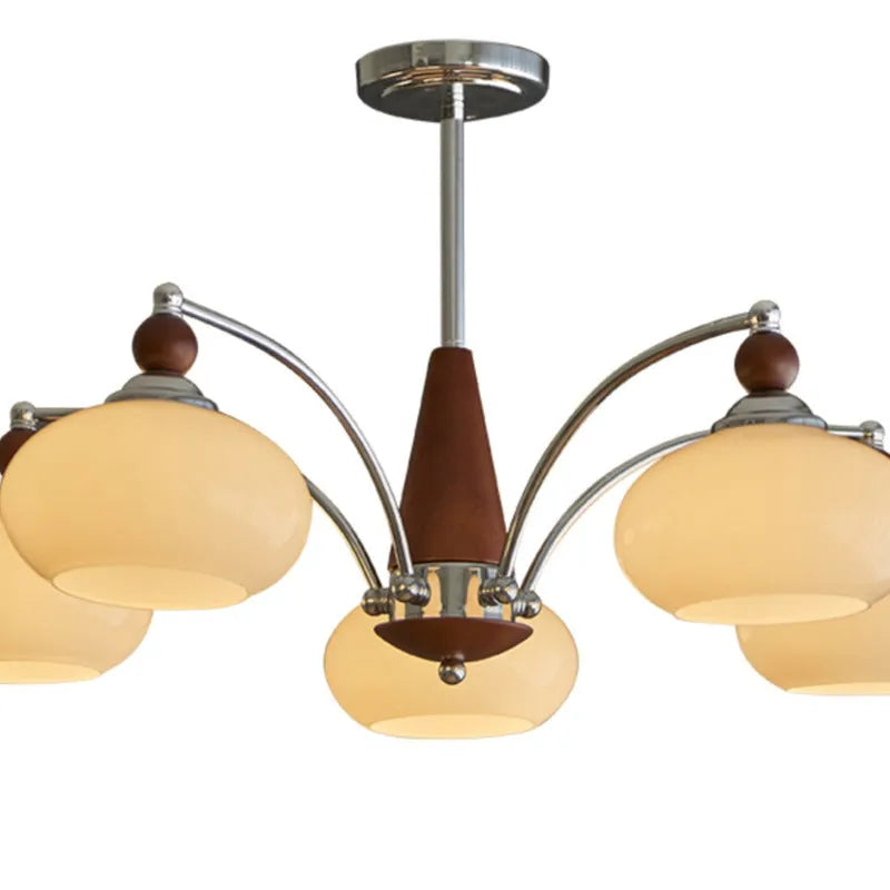 Chrome and persimmon glass chandelier ceiling light with multiple bulbs for dining room.