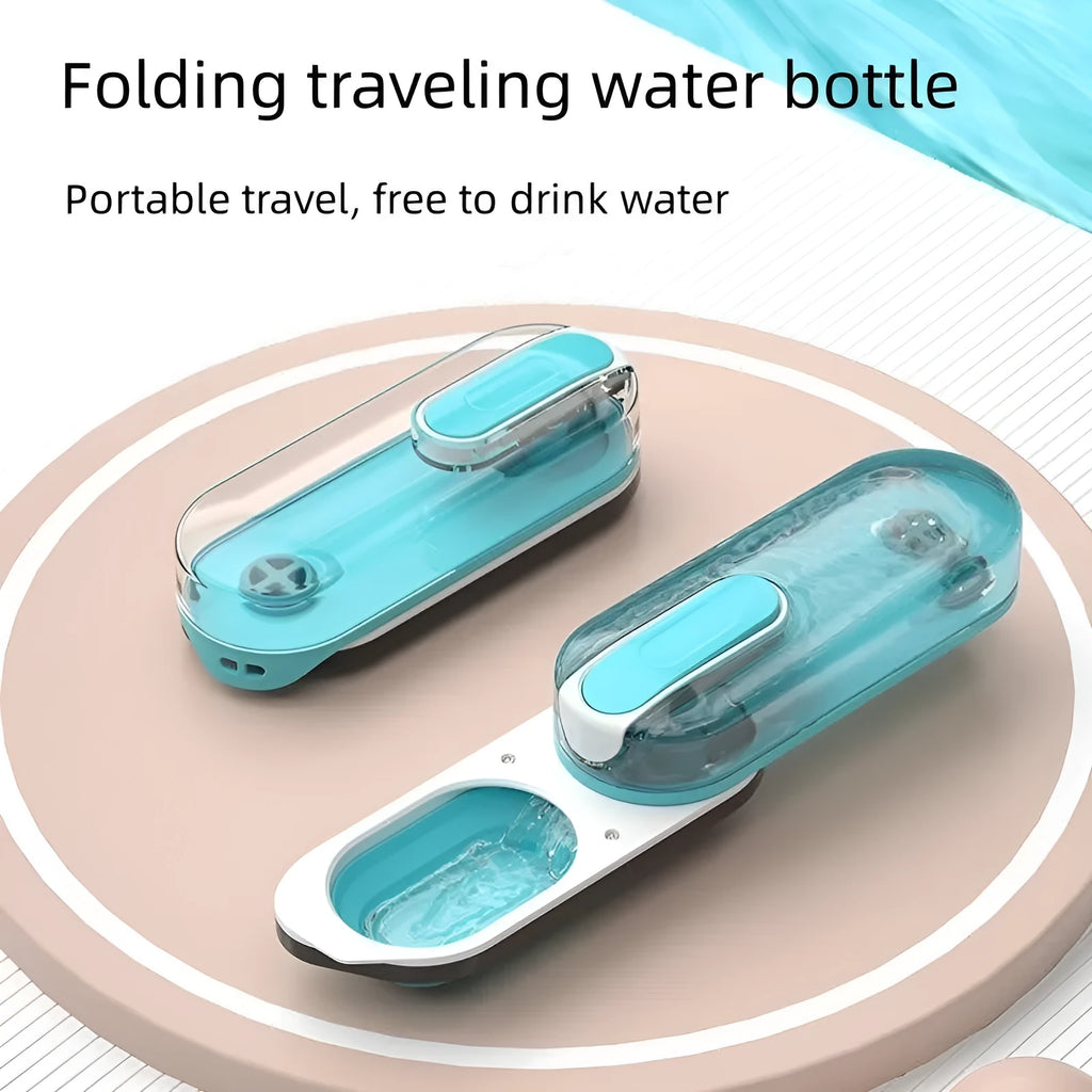 Portable blue dog water bottle with a folded silicone drinking bowl attached to its side.
