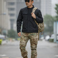 CP camouflage soft shell tactical jacket for mountaineering and camping on a mannequin