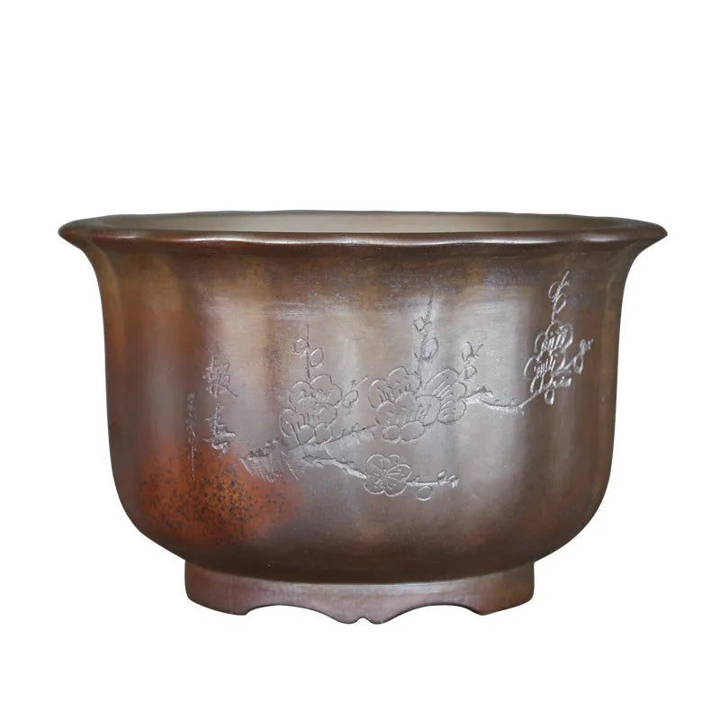 Indoor ceramic flower pot with wood burning antique carved design in purple sand clay