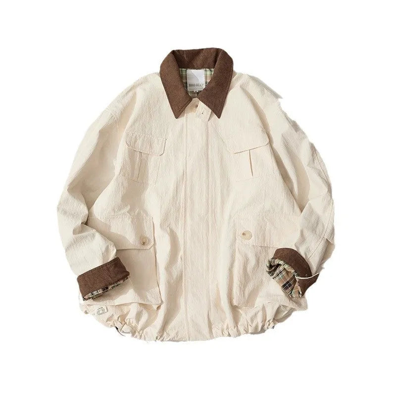 Green and apricot coloured casual jacket with side seam pockets on a mannequin