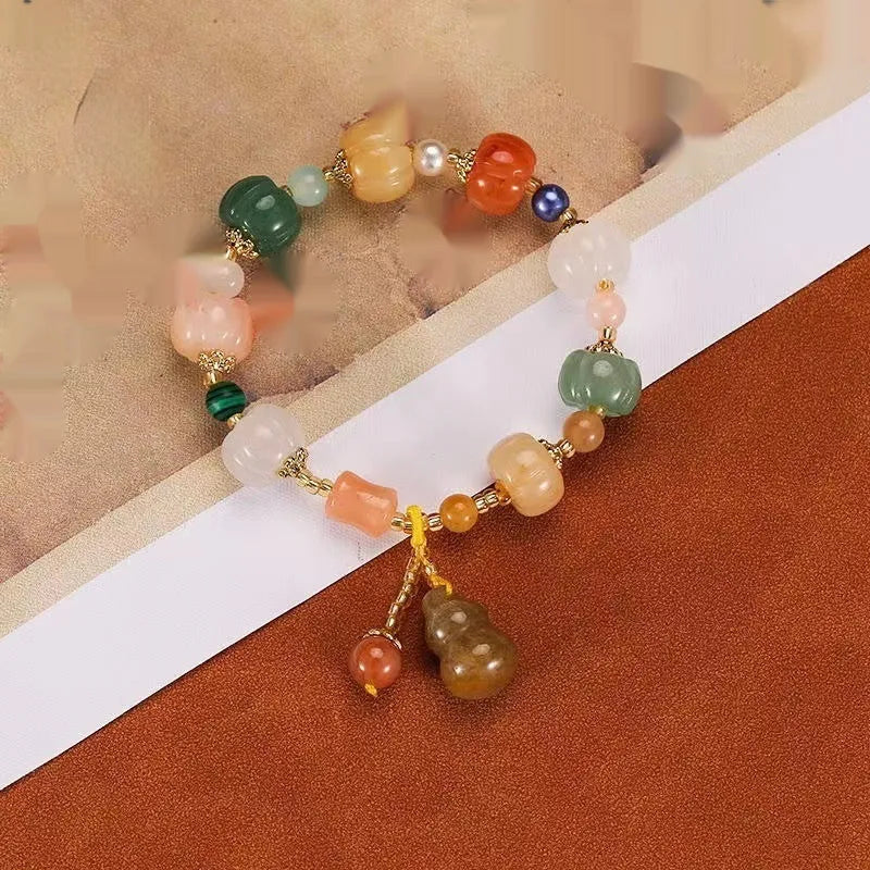 Carved bodhi root pumpkin lotus bracelet with white jade beads and mixed sizing