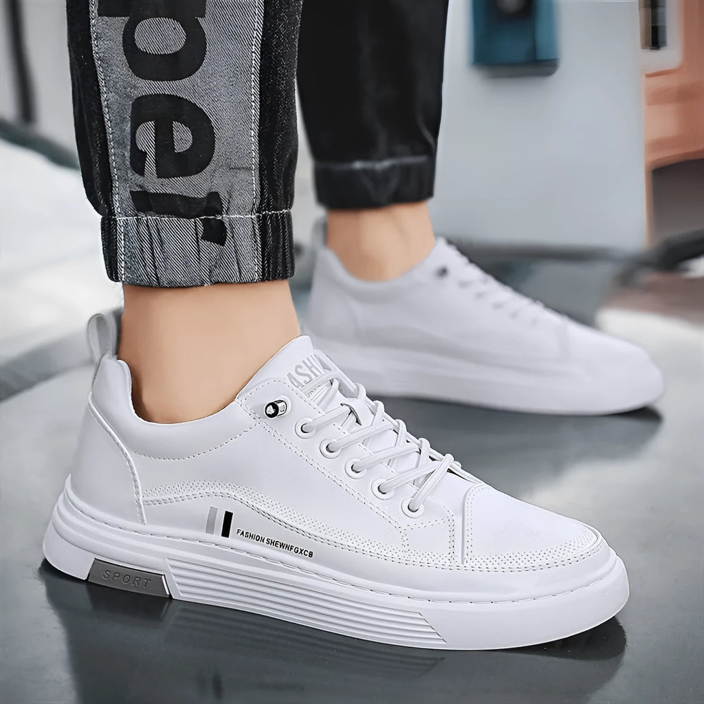 Men's white and black skateboard shoes with elastic band closure and rubber sole