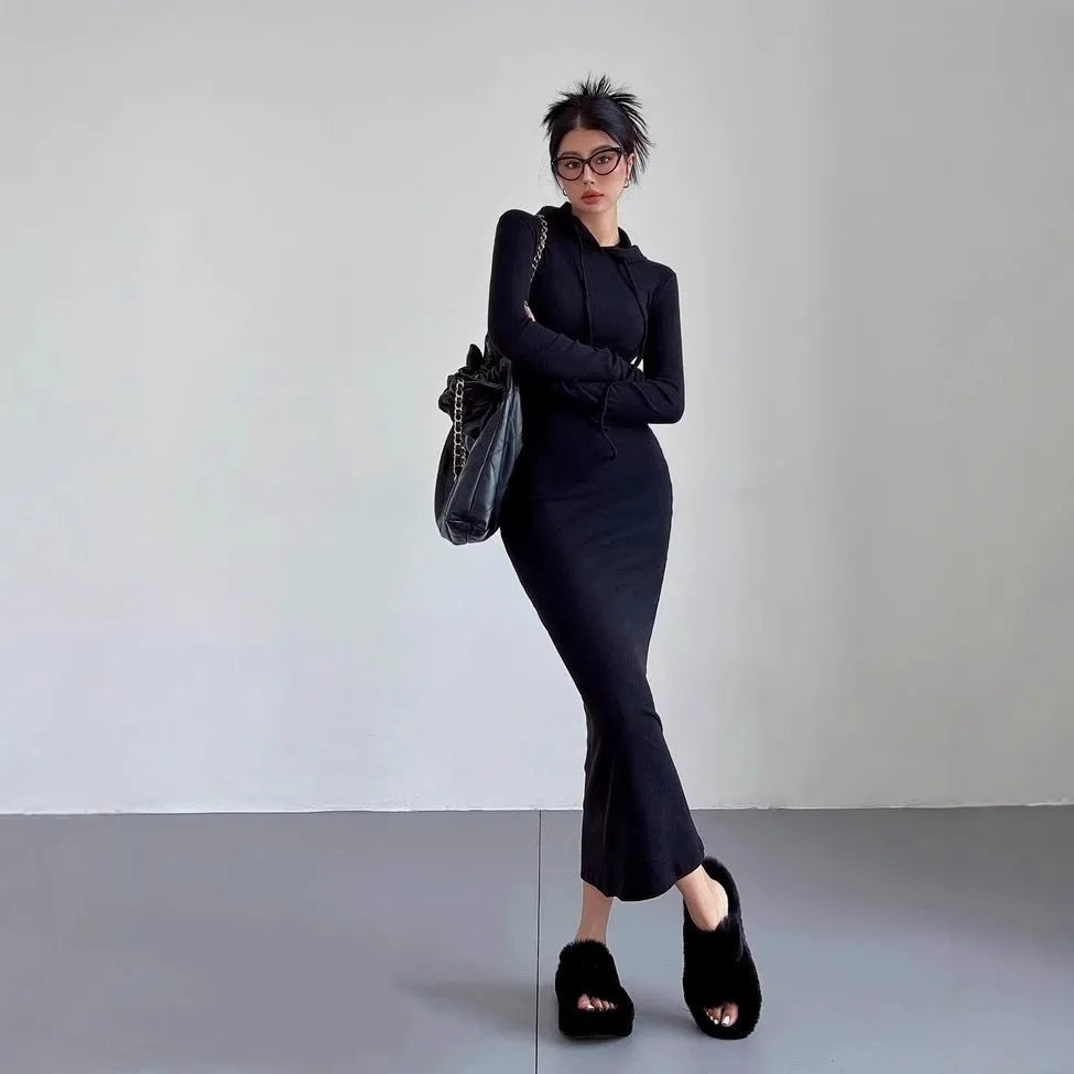 Women's long sleeve hooded sheath dress in polyester, shown in a neutral colour on a model.