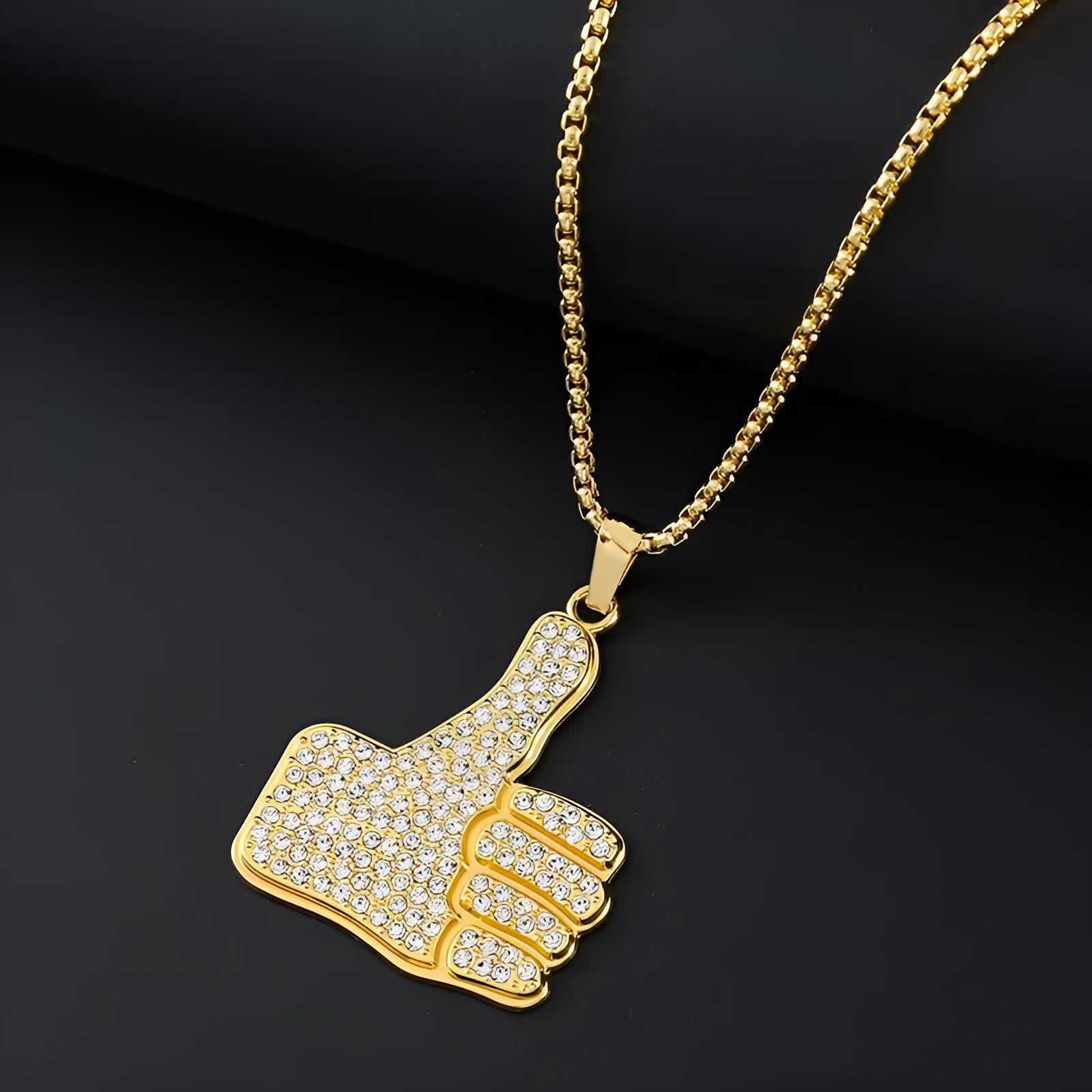 Gold tone geometric pendant necklace with zircon stone inlay and diamond cut finish