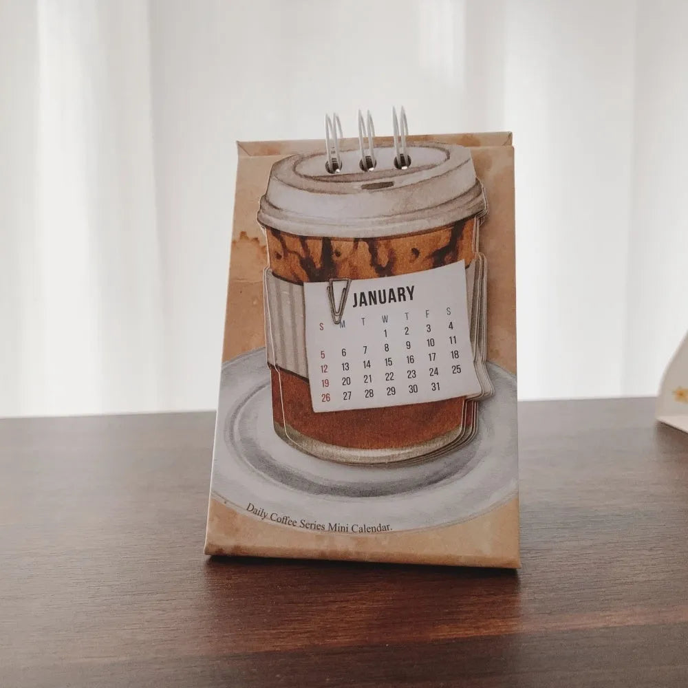 Mini 2025 desk calendar showing multiple design options including Coffee Time and Life Is Not Easy themes