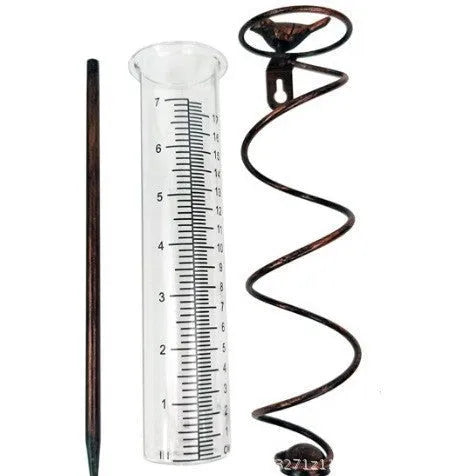 Cast iron hummingbird garden rain gauge with glass measurement tube showing 1-20 scale