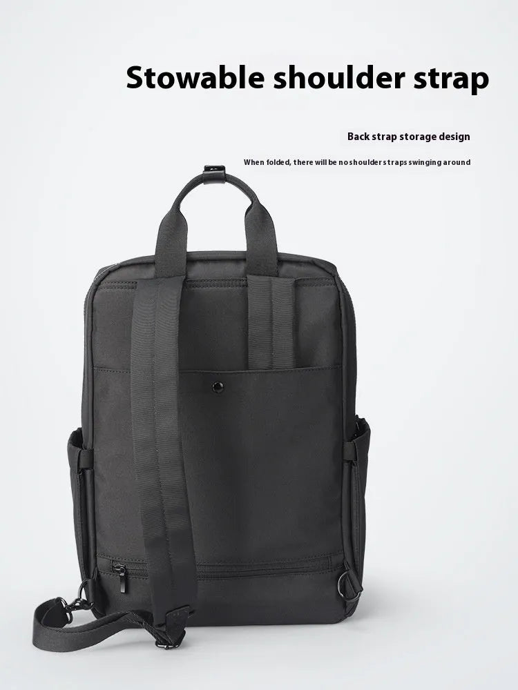 Black lightweight Oxford cloth computer backpack showing internal organisational compartments