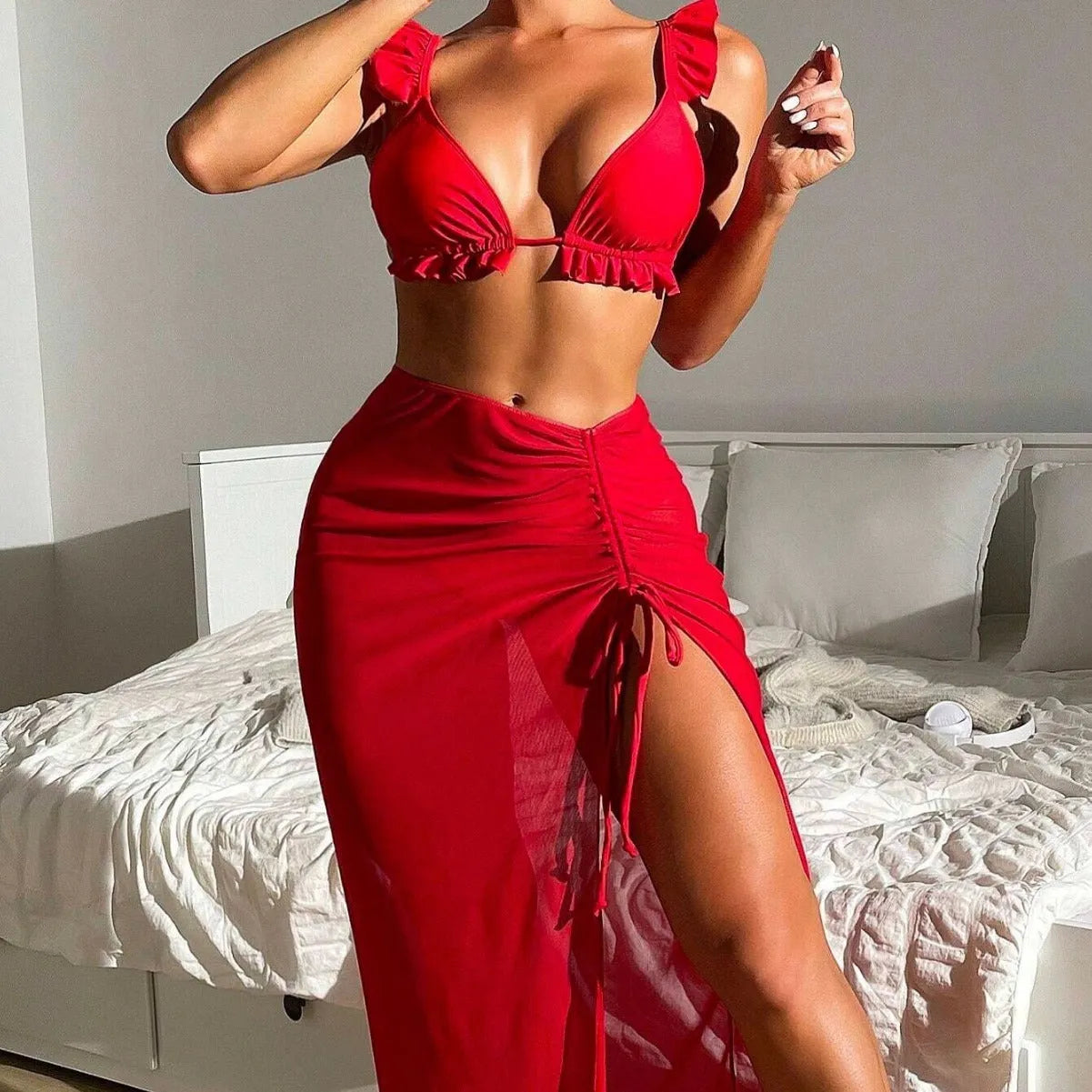 Women's printed three-piece swimsuit set showing top, pants, and skirt in multiple colour options.