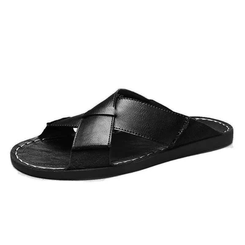 Men's black genuine leather slip-on sandals with a rubber sole on a plain background.