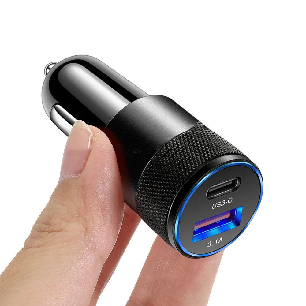 Aluminium alloy car phone charger mounted on a vehicle dashboard.