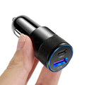 Aluminium alloy car phone charger mounted on a vehicle dashboard.